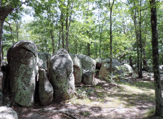 A long line of granite rocks along the path.