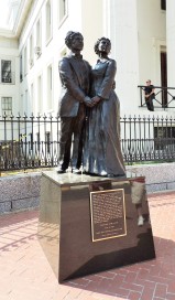 A statue of Dred Scott and his wife. Harriet, stands on the Courthouse grounds.