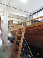 The reconstructed keel boat and the two pirogues are stored on the ground level of the Boat House when not in use on the river.